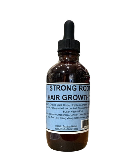 Bottle of hair growth oil with a label on a white background