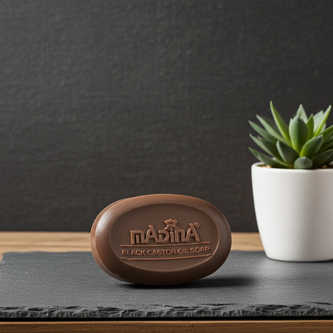 Handmade Jamaican black castor oil soap with a rich natural texture.
