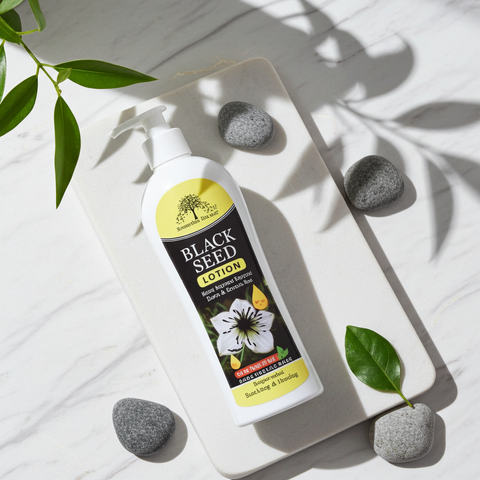 Herbal black seed lotion used for deep skin hydration.