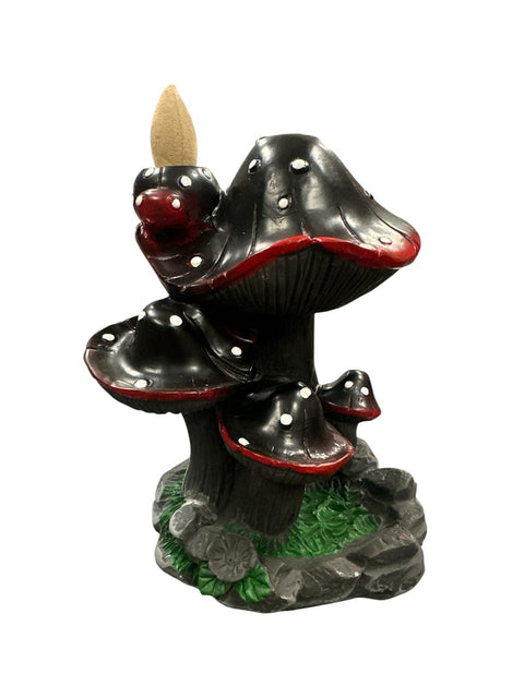 Mushroom-shaped backflow incense burner on a white background