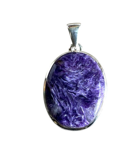 Purple marbled pendant with silver frame on a white background