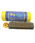 Tibetan Nagchampa incense with blue and yellow packaging on a white background