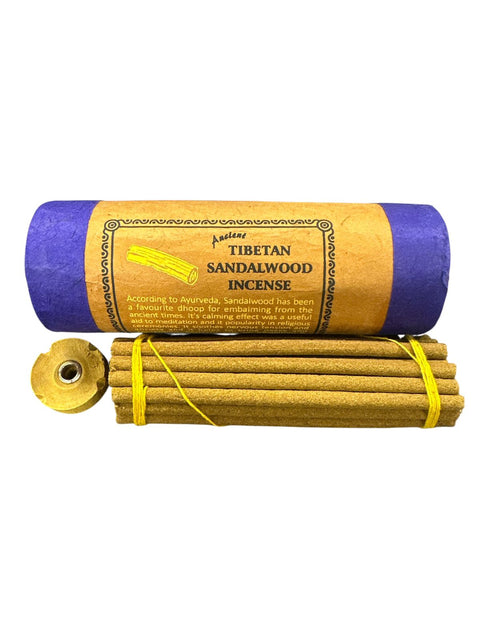 Tibetan sandalwood incense with packaging on a white background