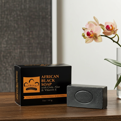 African Black Soap with Oats, Aloe and Vitamin E cleansing bar for bathing, soft exfoliation, and nourishing skin care.