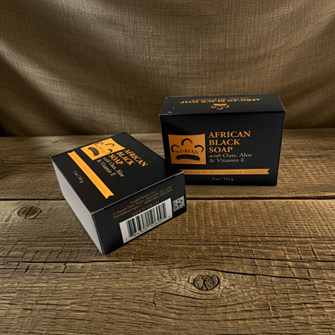 African Black Soap with Oats, Aloe and Vitamin E moisturizing soap bar for daily washing, soothing dry skin, and gentle cleansing.