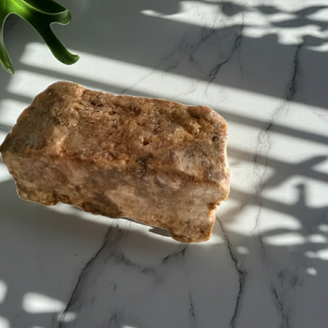 African raw black soap bar for natural skincare and daily cleansing.