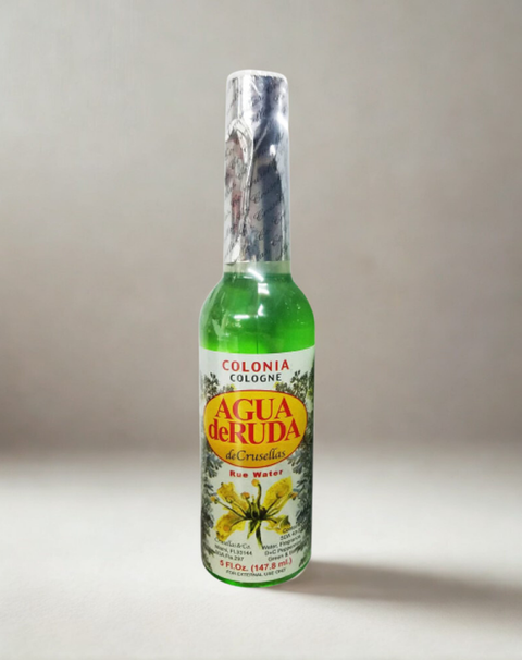 Agua de Ruda in a bottle used for prayer, cleansing, and ceremonial practices.