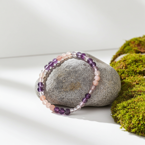 Amavida amethyst, rose quartz, and clear quartz crystal bead bracelet for chakra support, mindful wear, and spiritual wellness.