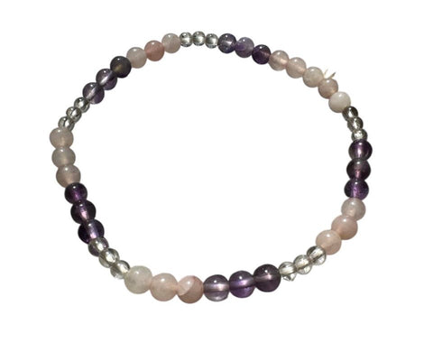 Amavida healing crystal beaded bracelet with natural amethyst, rose quartz, and clear quartz for calming, heart-centered intention, and everyday healing use.