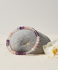 Amavida Healing Crystal Bracelet with amethyst, rose quartz, and clear quartz beads for meditation, emotional balance, and daily energy healing.
