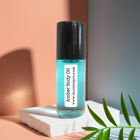 Amber Body Oil unisex body oil bottle for moisturizing skin and adding a warm everyday fragrance.