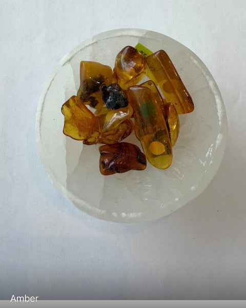 Amber Tumbled Stone natural honey-gold piece for warmth, stress relief, and meditation.