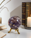 Amethyst orgonite crystal ball sphere for energy healing, meditation, and spiritual balance.