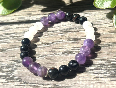 Amethyst, rose quartz, and tourmaline crystal bracelet bead bracelet for calming energy, heart-centered intention, and everyday accessory use.