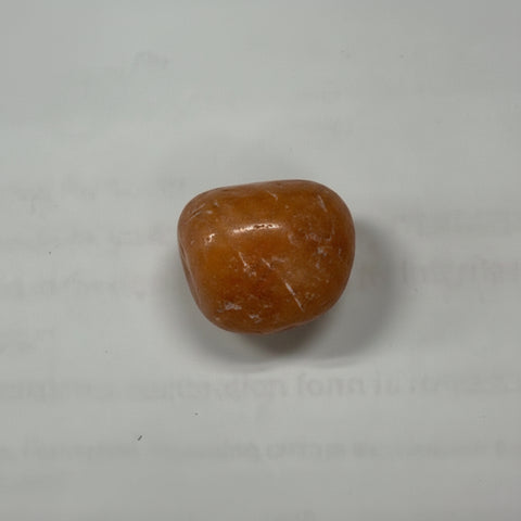 Aragonite pocket tumbled stone for carrying during meditation, grounding, and daily energy support.