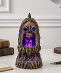 Backflow Incense Burner Crystal Cave & Skull resin burner for cascading incense smoke display, gothic decor, and meditation use.