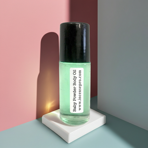 Body oil with Baby Powder fragrance in a bottle for nourishing skin, post-shower moisture, and everyday use.