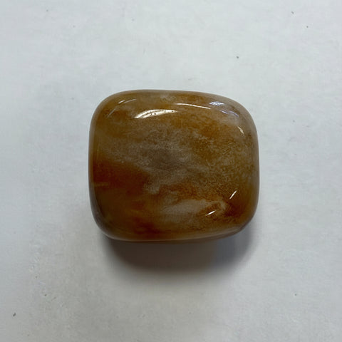 Brown Chalcedony pocket tumbled stone for carrying during meditation, grounding, and daily energy support.