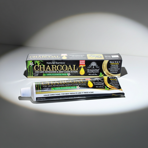 Charcoal toothpaste tube for stain removal, deep cleaning, and regular brushing care.