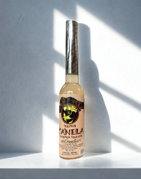 Bottle of Cinnamon Cologne Spiritual Water for ritual use, blessings, and spiritual cleansing.