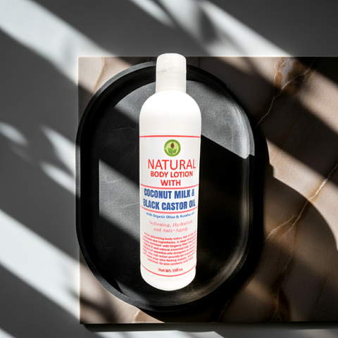 Bottle of coconut milk and black castor oil lotion for moisturizing dry skin.
