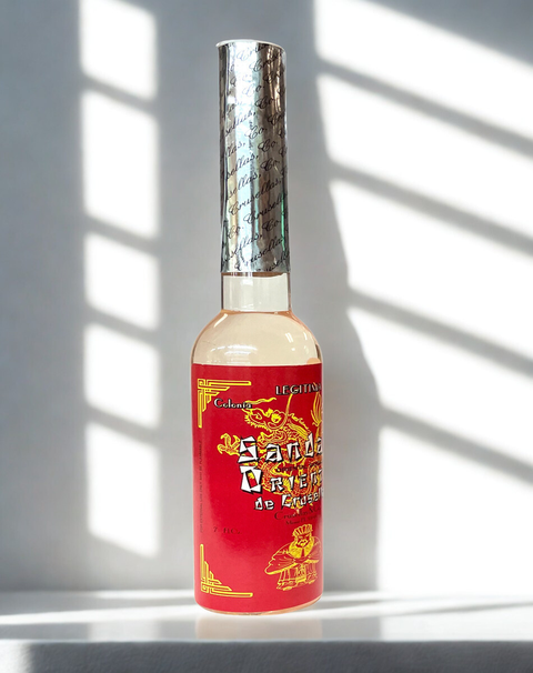 Crusellas sandalwood spiritual water displayed in a bottle for altar use and sacred rituals.