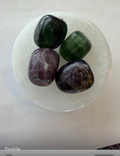Rainbow Fluorite Tumbled Stones group — natural green and purple banding for clarity, focus, and emotional balance.