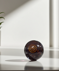 Garnet Orgonite Crystal Ball healing sphere for energy balancing, meditation, and spiritual décor use.