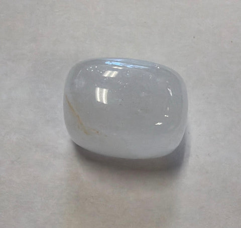 Genuine Clear Quartz tumbled healing stone for chakra balancing, mindfulness practice, and energy work.