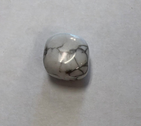 Howlite polished stone with dark natural veining for ornamental display, collecting, and crystal décor.