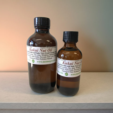 Pure kukui nut carrier oil in a clean bottle for skincare and haircare use.