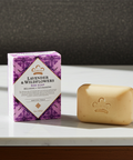 Moisturizing lavender soap bar for dry skin cleansing, bathing, and softening care.