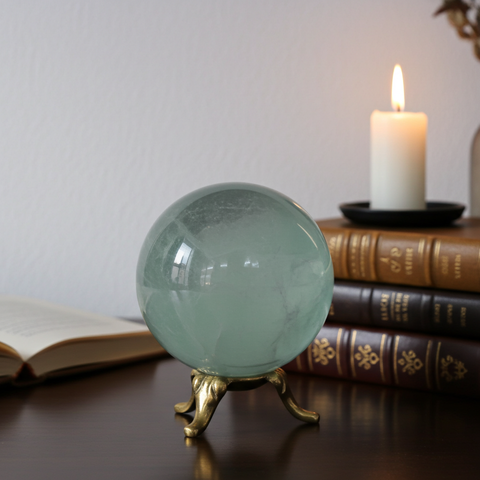 Natural Amazonite crystal ball polished stone sphere for crystal healing, mindfulness, and display use.