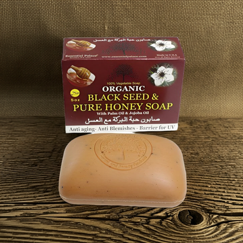 Natural soap made with black seed and pure honey for skincare use.
