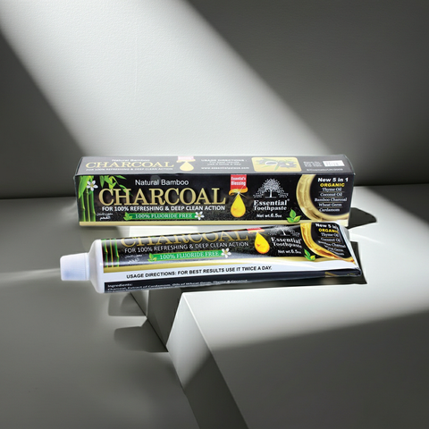 Natural charcoal toothpaste paste for fresh breath, plaque control, and daily oral care use.