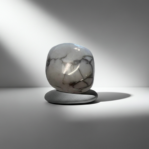 Natural Howlite crystal tumble with marble-like veining for home décor, meditation spaces, and shelf styling.