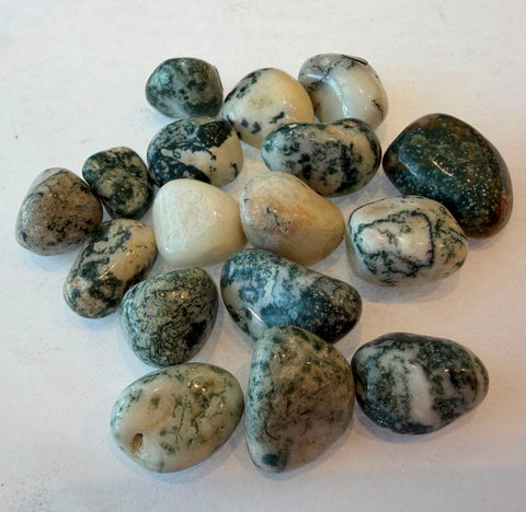 Natural Moss Agate crystal with translucent body and green inclusions