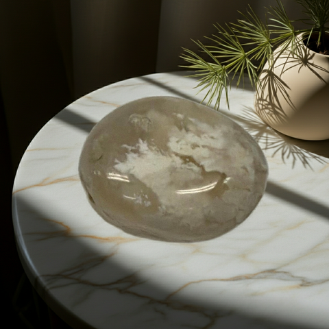 Natural Snow Agate tumbled stone for emotional balance, spiritual practice, and mindful energy work.