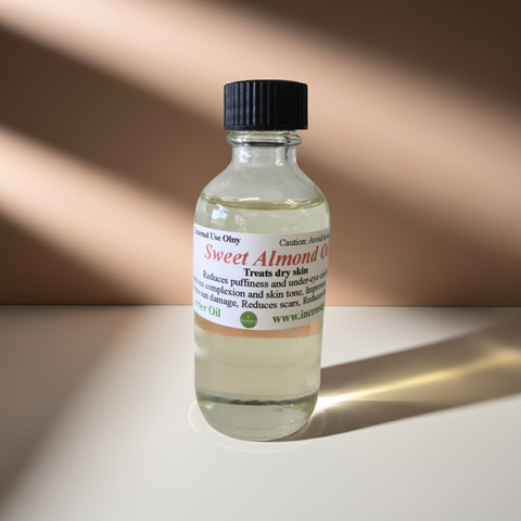 Natural sweet almond carrier oil displayed as a beauty and wellness product.