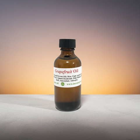 Organic grapefruit carrier oil product shot on a neutral background.