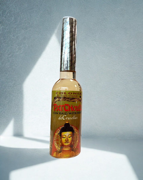 Bottle of Patchouli with Root Cologne Spiritual Water for cleansing, blessing, and spiritual use.