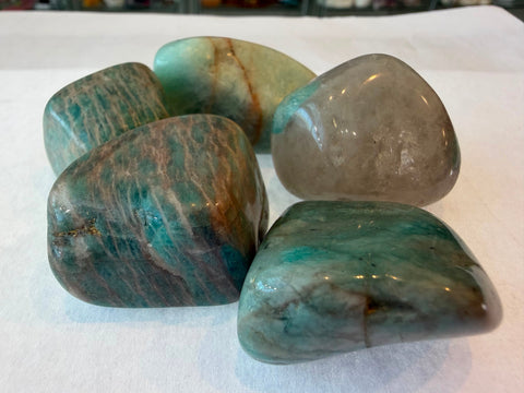 Amazonite tumbled stone with turquoise-green tones and white marbling