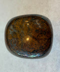 Polished Bronzite tumbled stones with natural bronze schiller variation