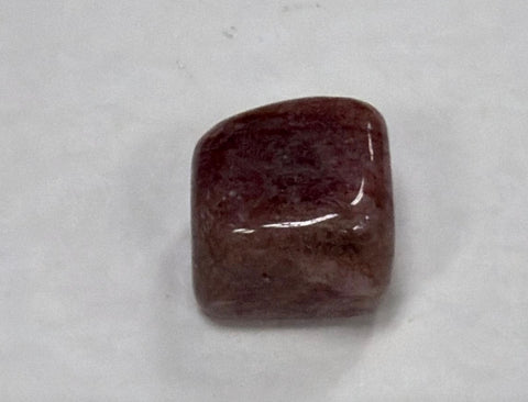 Polished Strawberry Quartz pocket stone for carrying during meditation, emotional healing, and spiritual support.