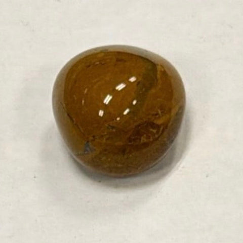 Polished Yellow Jasper tumbled crystal stone for chakra work, calming practice, and spiritual grounding.