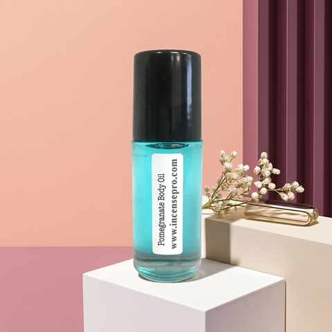 Pomegranate body oil bottle for hydrating rough skin, improving softness, and post-shower body moisturization.