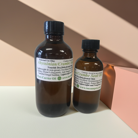 Pure Abyssinian or Crambe Seed carrier oil displayed in a clear cosmetic bottle.