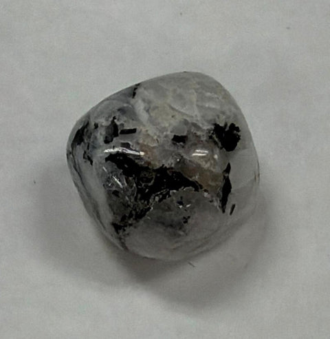 Rainbow Moonstone healing tumbled stone crystal for emotional balance, spiritual cleansing, and healing rituals.