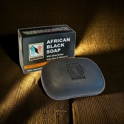 Raw African black soap with shea butter designed to leave skin soft and refreshed.