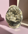 Adjustable ring featuring a raw pyrite crystal with a natural metallic gold-tone finish.